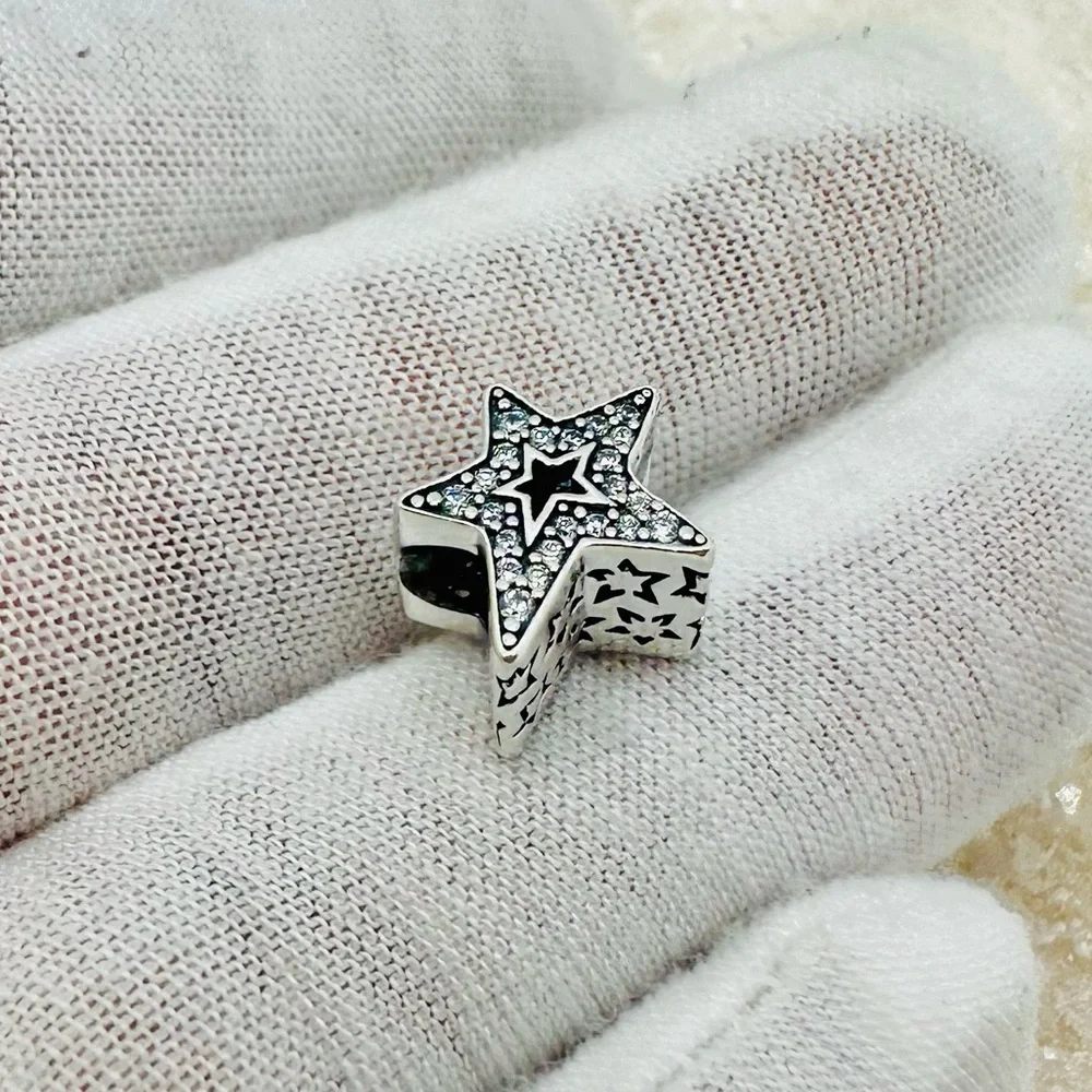 EUC Pandora 790016C01 Sterling Silver Asymmetric Star Charm w/ Clear CZ’s